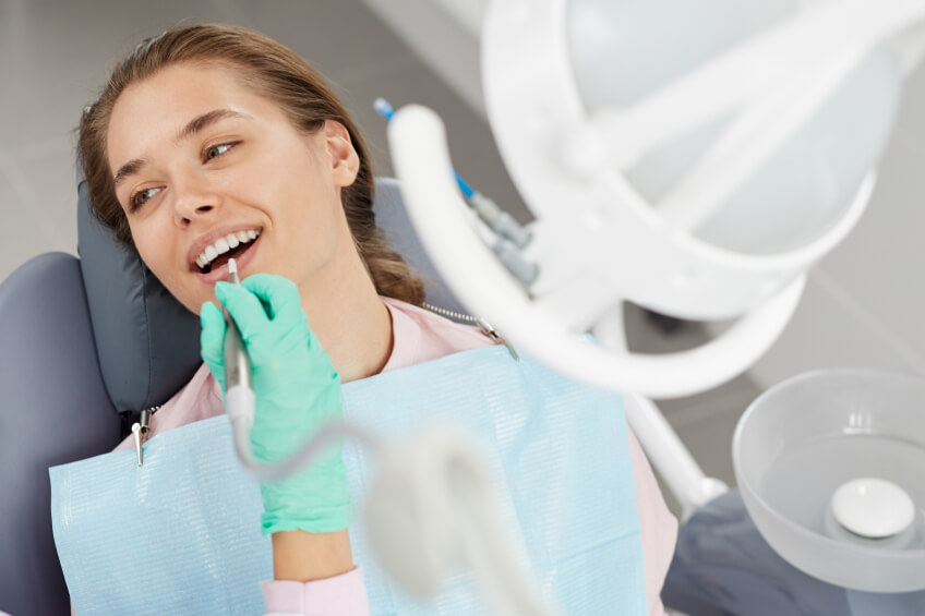 woman getting a perio cleaning